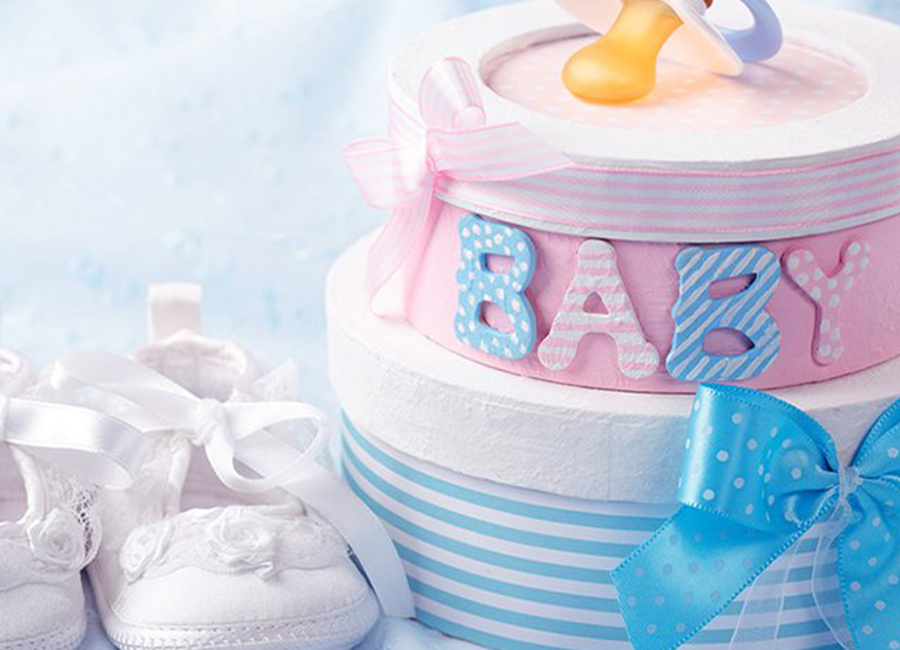 Baby shoes and cake at Christenings event